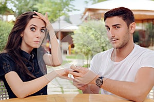 Surprised Woman Receiving Engagement Ring from Man