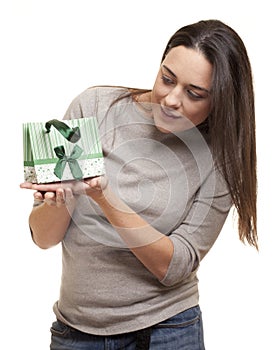 Surprised woman after receiving a present