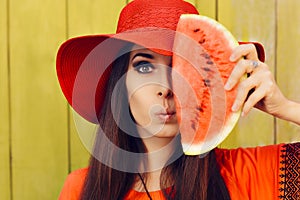 Surprised Woman in Red Hat with Watermelon Slice