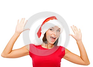 Surprised woman in santa helper hat