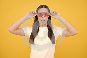 Surprised woman, shocking girl wearing funny glasses on isolated yellow background, Wow face feelings with copy space