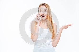 Surprised woman talking on the phone