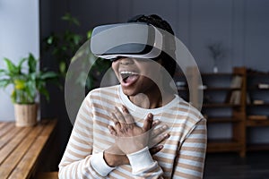 Surprised woman use vr glasses headset simulator enjoy experience from virtual reality goggles games