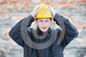 Surprised worker man in construction