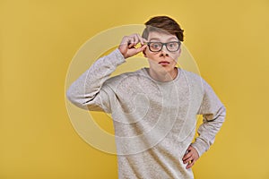 surprised young man in glasses and