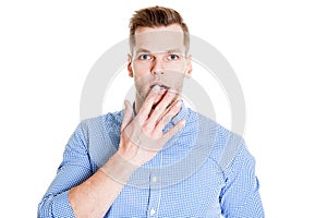 Surprised Young man isolated on white background