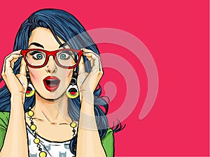 Surprised young woman with open mouth in glasses.Comic woman. photo