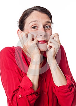 Surprised young woman smiling expressing excitement