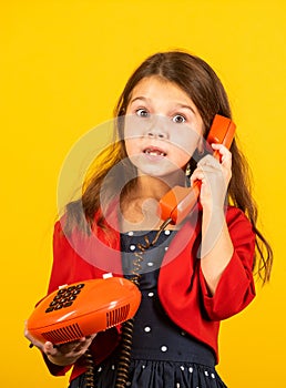 Surprising news. Little talker. Retro style. Communication concept. Shopping online. Retro girl speak phone. Kid talking