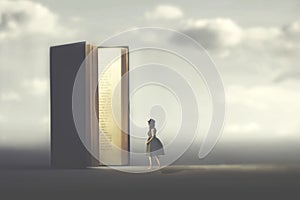 Surreal book opens a door illuminated to a woman, concept of way to freedom