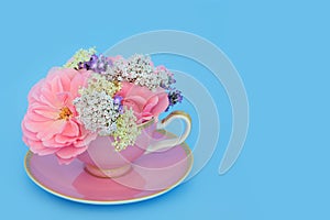 Surreal Flower and Herb Tea Cup Arrangement