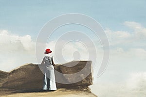 Surreal headless woman with red hat looking at infinity, concept of identity and freedom