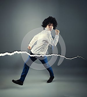 Surreal image  of a businessman running