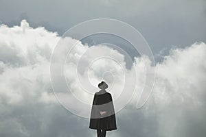 Surreal meditative man in front of a cloudy sky photo