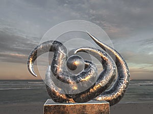 Surreal Metallic Sculpture On the Beach