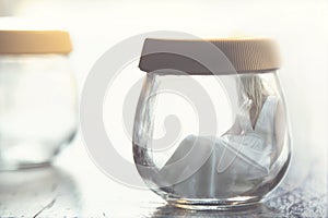 Surreal moment of a woman inside a glass jar