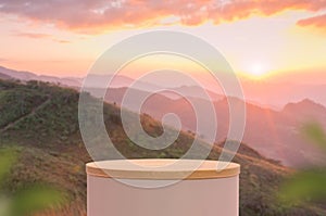 Surreal podium outdoors on sky golden pink pastel at sunset with mountain nature landscape background.Beauty cosmetic product