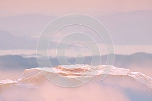 Surreal stone podium nature landscape outdoor on sky pink blue pastel soft cloud blurred background.Beauty cosmetic product