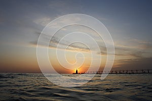 Surreal Sunset: Tranquil Waves and Ethereal Sky at Lake Michigan