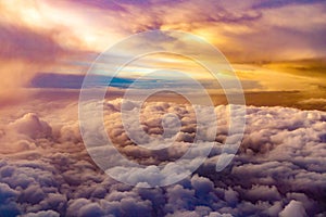 Surreal view from above with a blanket of clouds