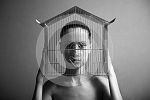 Surrealistic woman with cage