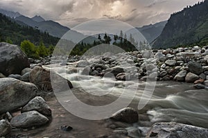 The surrounding mountains and river from Manali photo
