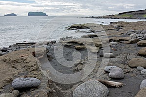 Surtsey by horizon from Heimaey Island