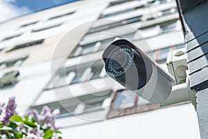 Surveillance camera, against the backdrop of a white house