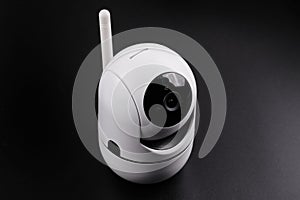 Surveillance camera, videcam, cctv camera isolated on black background close up. home security system