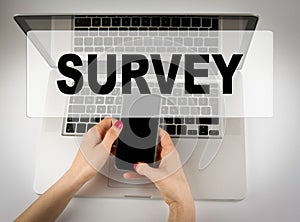 Survey concept. Business woman working with computer