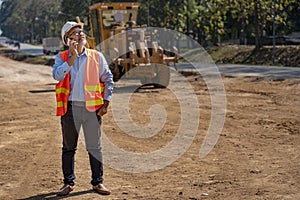 Surveyor builder Engineer technician  Business Team discuss plan at new construction site