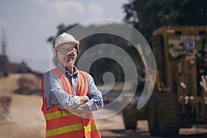 Surveyor builder Engineer technician  Business Team discuss plan at new construction site