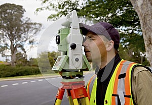 Surveyor checks his work on construction project