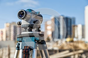 Surveyor equipment GPS system or theodolite outdoors at highway construction site.Measuring instrument close-up. Surveyor