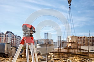 Surveyor equipment GPS system or theodolite outdoors at highway construction site.Measuring instrument close-up. Surveyor