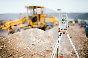 Surveyor equipment GPS system or theodolite outdoors at highway construction site. Surveyor engineering with total station