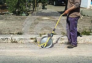 Surveyor with measuring wheel (odometer)