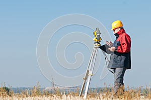 Surveyor theodolite worker photo