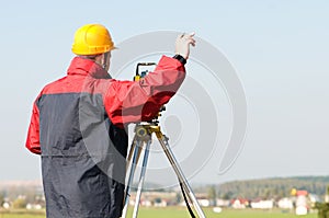 Surveyor theodolite works photo