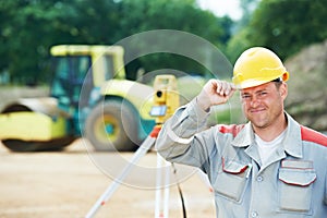 Surveyor works with theodolite