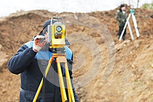Surveyor works with total station