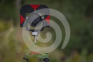 Surveyors with instruments on railway track near green forest in south Bohemia