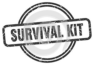 survival kit stamp. survival kit round vintage grunge label.