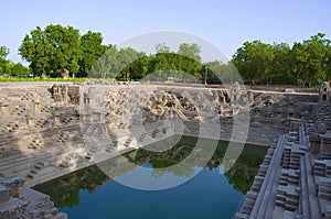 Suryakunda, The reservoir has steps to reach bottom and numerous small shrines, Sun Temple complex. Modhera, Mehsana, Gujarat