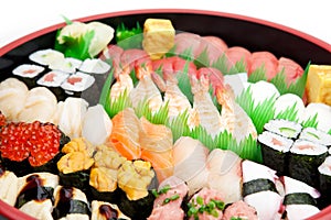 Sushi arranged in a traditional sushi tray