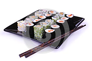 Sushi on the black plate