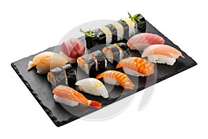 Sushi on black stone plate