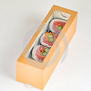 Sushi Box With Cucumbers and Tomatoes