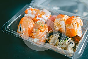 Sushi Cheap set Japanese street food with salmon raw fish and tobiko decoration