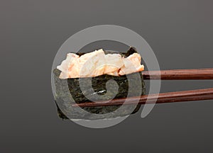 Sushi with chopsticks